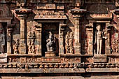 The great Chola temples of Tamil Nadu - The Airavatesvara temple of Darasuram. Figures of various deities framed in niches on the south wall of the sanctuary. 